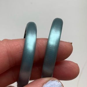 Gorgeous lucite hoop earrings.